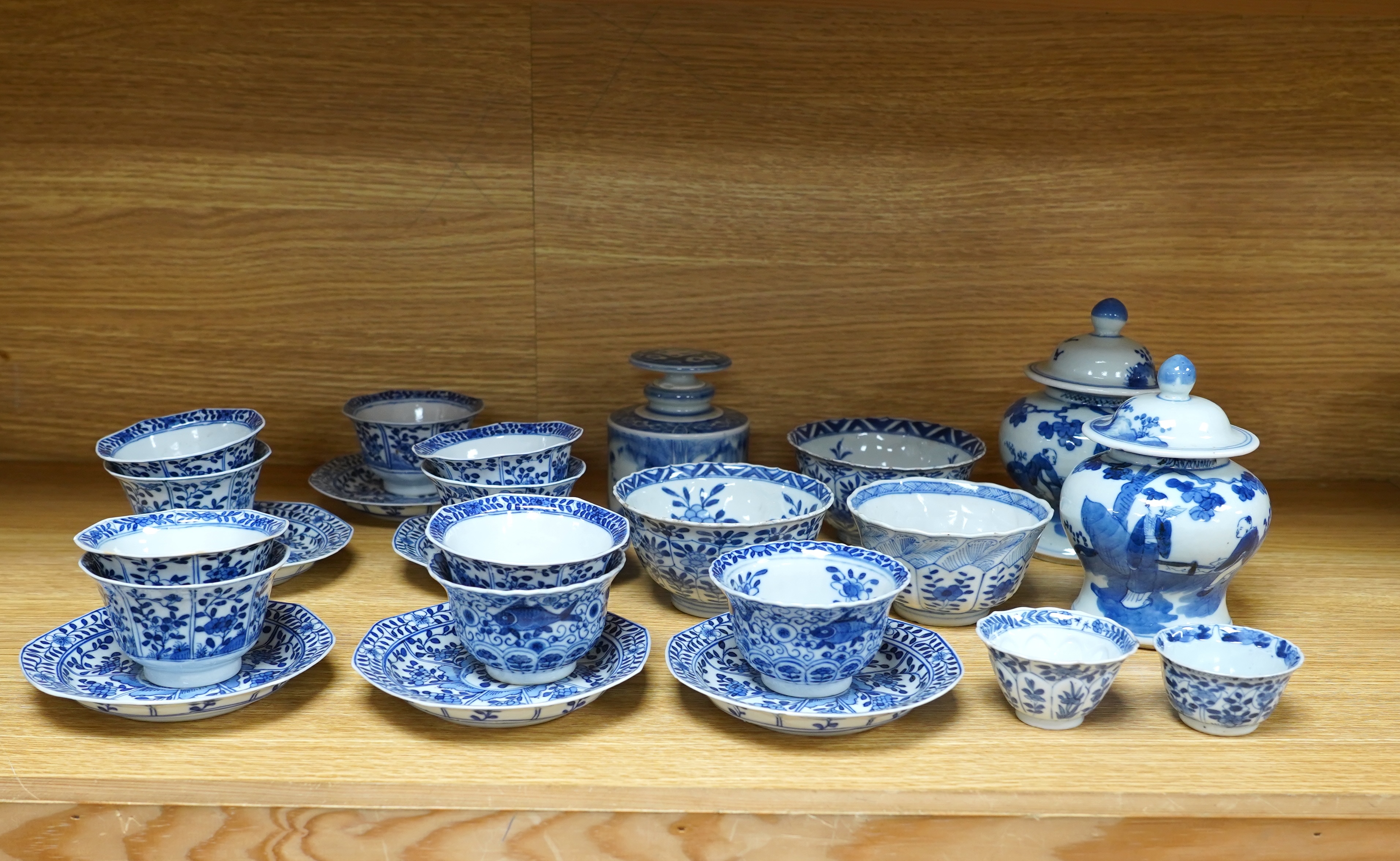 A quantity of 19th century Chinese blue and white porcelain including pair of baluster jars and covers and tea bowls, largest 14cm high
